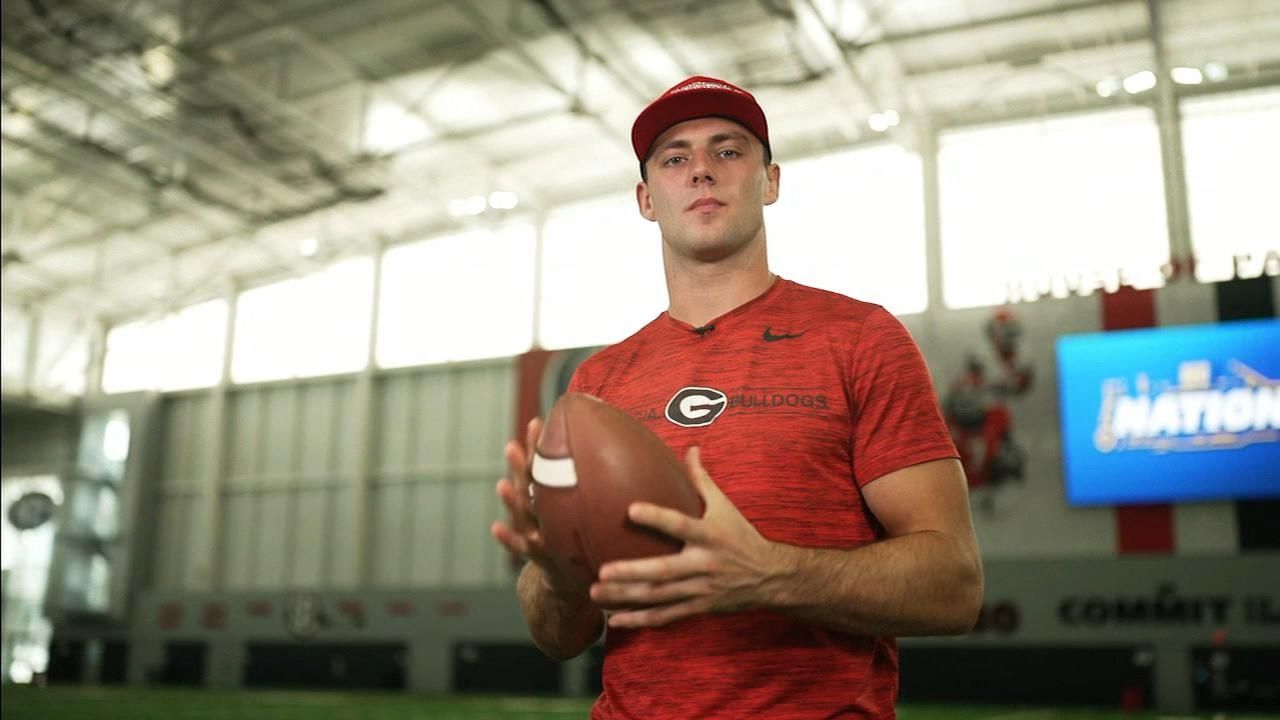 Tebow chats with and learns about Georgia TE Bowers